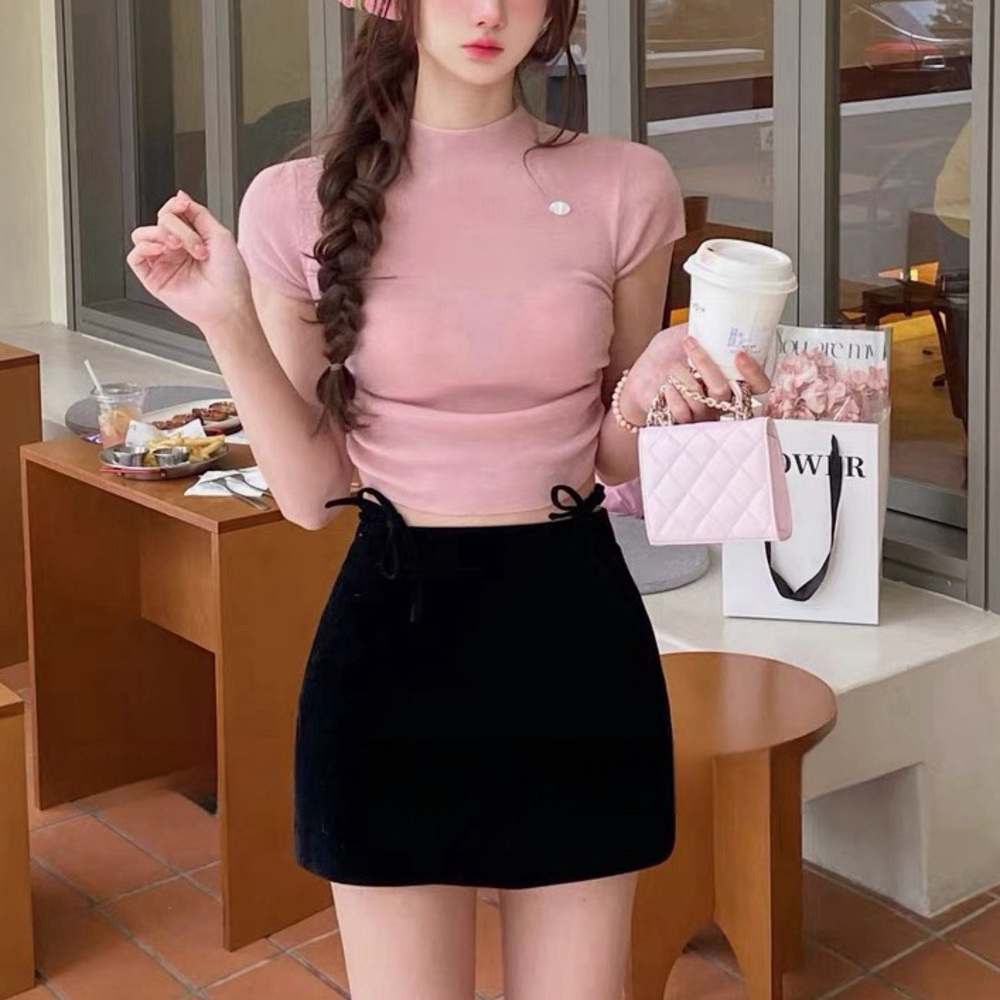 Black velvet mini Aline skort with bow tie details and heart patch